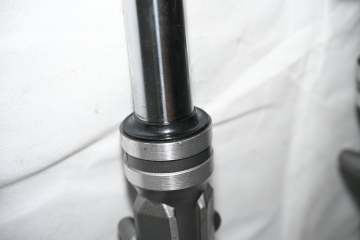 Inner spring knife shock absorber