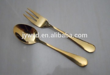 gold dessert spoon and fork