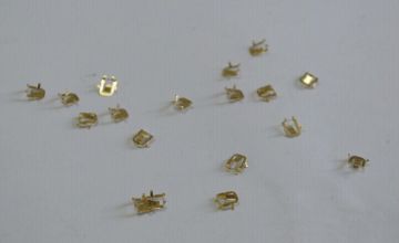 Metal stamping miniature gilt shrapnel