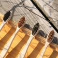 Wave shape charcoal bristle bamboo toothbrush