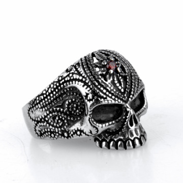 Polished electroplated skull ring with ruby