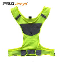 tessuto fluorescente verde con gilet riflettente