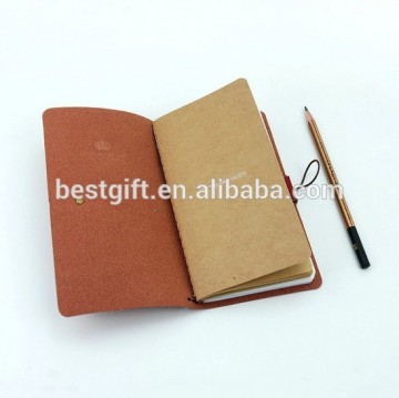 brown paper notebook