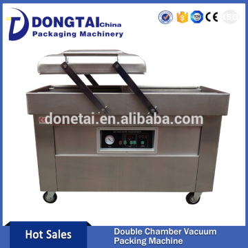 Double chamber vacuum packing machine