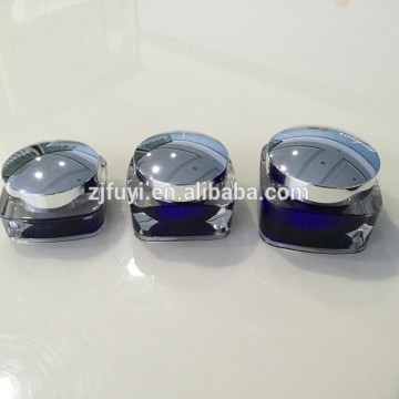 Blue plastic cosmetics cream empty jar