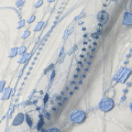 Tissu de broderie de dentelle bleue et blanche