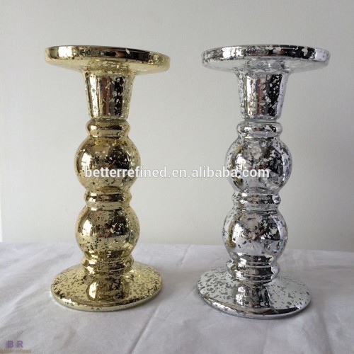 tall gold and silver candle holder