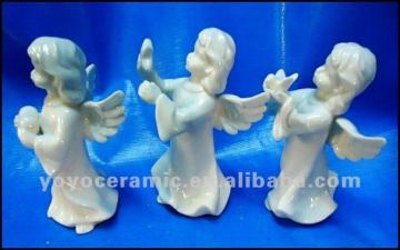 white ceramic angel figurines