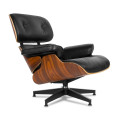 Charles Eames chaise longue è replica pouf