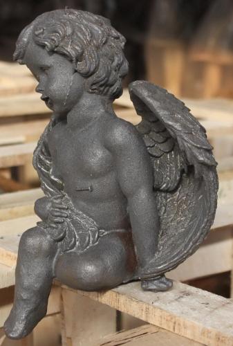 winged child cast iron home and garden decoration