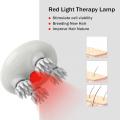 electric scalp massager with red therapy lamp