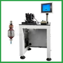 Automatic positioning rotor balancing machine
