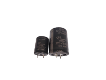 Long term medium voltage horn type electrolytic capacitor