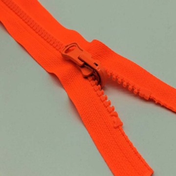 Bright-coloured plastic zipper for garment