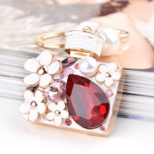 2016 new arrival wholesale flower scent-bottle alloy rhinestone keychains
