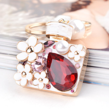 2016 new arrival wholesale flower scent-bottle alloy rhinestone keychains