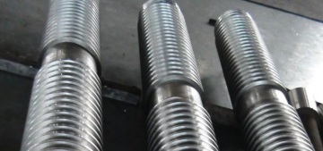 Grooved alloy steel roll