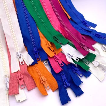 Various colour plastic separating coat zippers