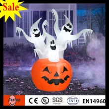 Inflatable Halloween ghosts and pumpkin below them