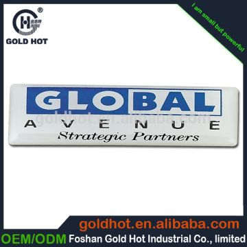 Foil embossed domed label