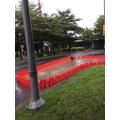 Freestanding flood boxwall flood protection for urban road