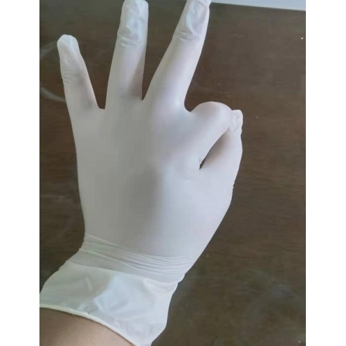 Yellow medical vinyl glove