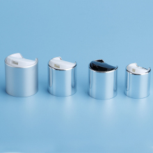 Cosmetic disc top cap