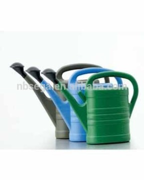 plastic garden flower watering can