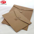 Brown kraft envelope with string and button