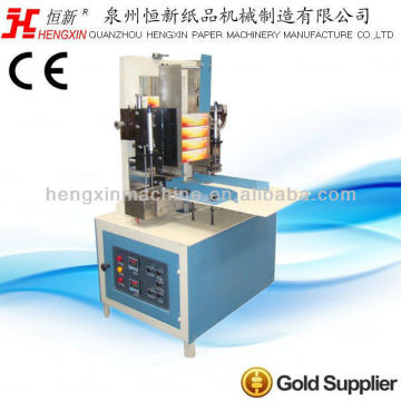 Facial tissue paper box sealing machine