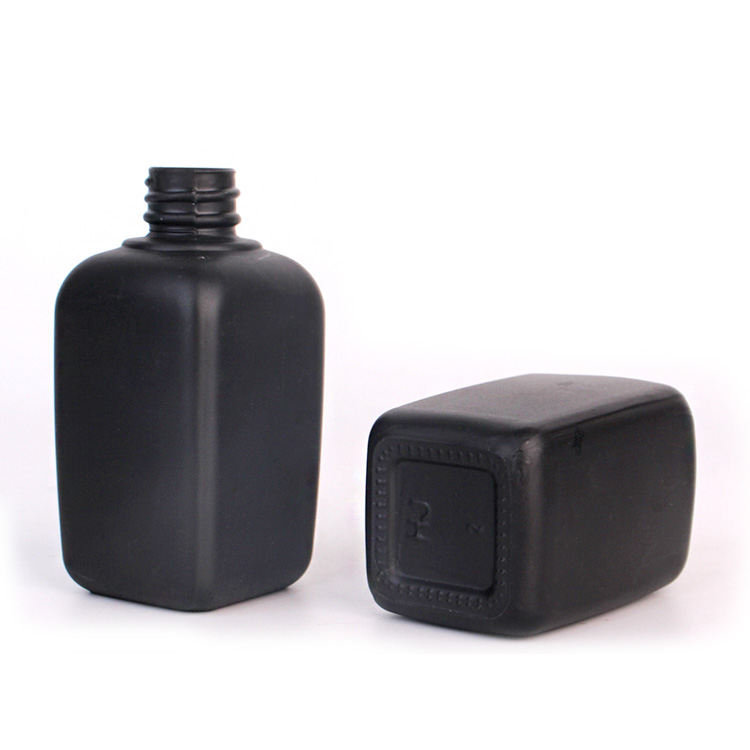 square 50ml glass bottle black colored with pump cap