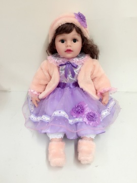 18" pink coat vinyl doll