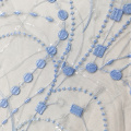 Tissu de broderie de dentelle bleue et blanche