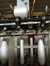 Rimless take-up Bobbin two for one twisting machine