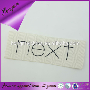 End fold herring bone printed labels with soft polyester yarn