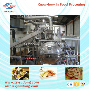 Continuous deep vacuum frying machine for fruit chips