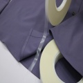 Hot melt adhesive film for non-marking garments