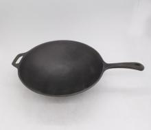 Cast iron kitchen wok for cooking