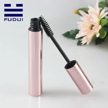 Young Girl Empty metalized Pink Mascara Tube