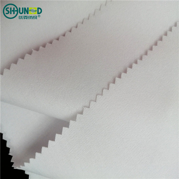 China Wholesale Manufacture Hard Shirt Interlining 100% Polyester 155gsm Fusible Collar Lining for Men Shirt