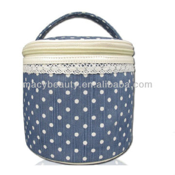 Cylinder cosmetic case with polka dot design