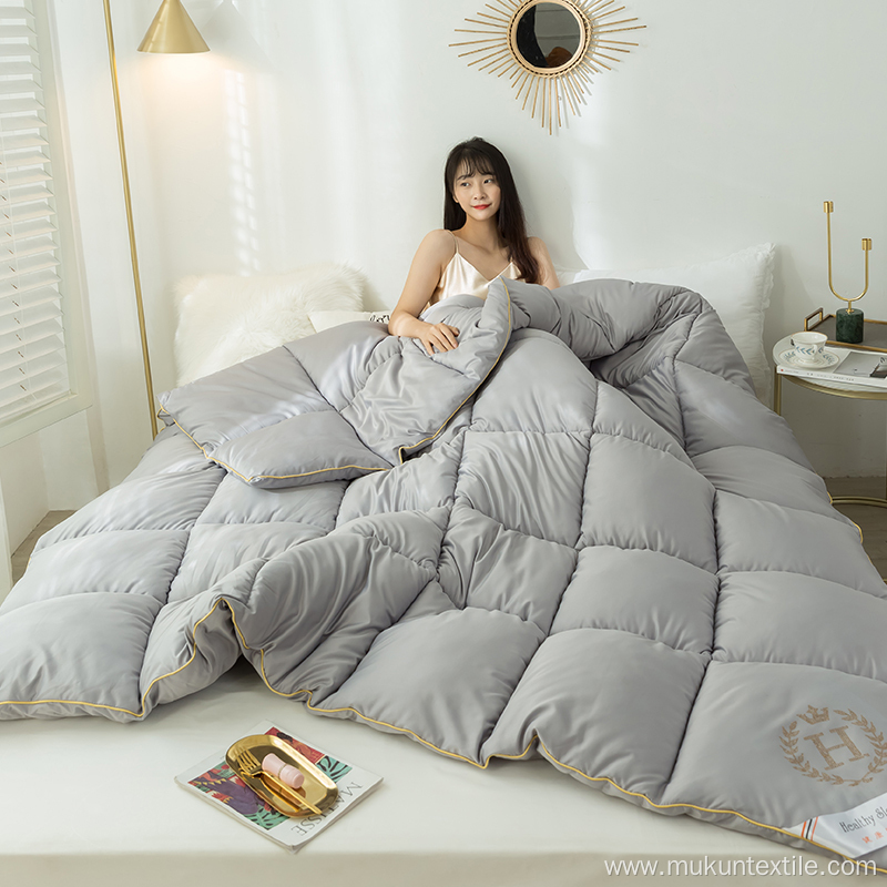 Solid color down alternative filled comforter