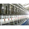 Mid-set milking parlors for cows