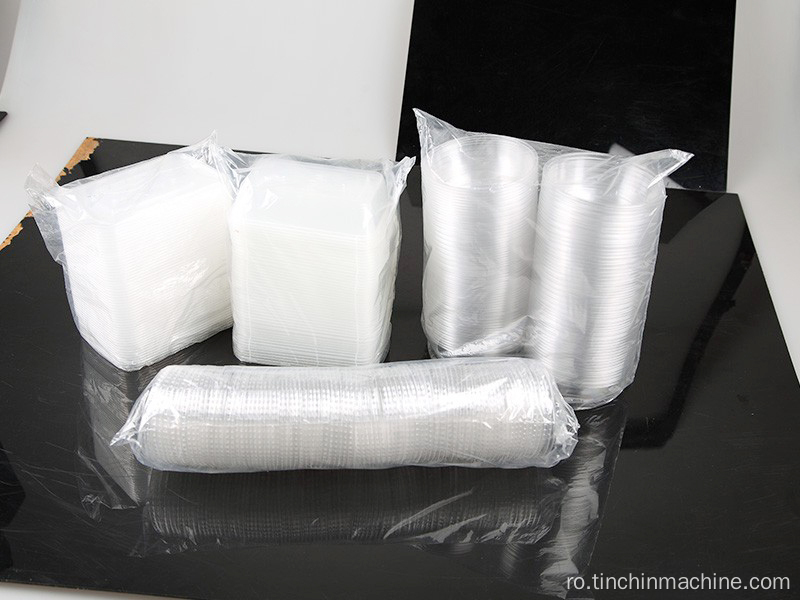 Mașină automată de ambalare a hârtiei/a recipientelor din plastic