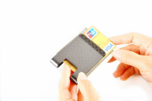 Carbon money clip with RFID blocking function