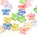 Groothandel glitter pastel losse kleurrijke spinkle hars bloem mooie charmes miniatuur stickers platte achterkant ambachten voor decoratie