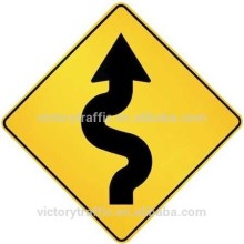 Traffic safety sign with high performance reflective sheeting