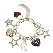 Fancy charm bracelet with heart and star pendant