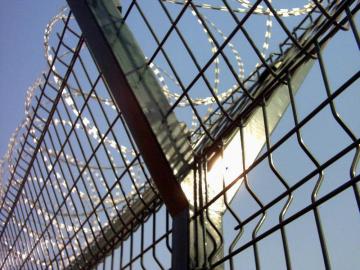 Airport Fence With Barbed Wire Protecting Mesh