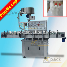 Automatic plastic cap screwing machine